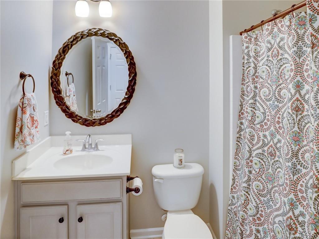 3462 Richard's Crossing Fort Mill, SC 29708 - Photo 21 of 42 a bathroom with a toilet sink and mirror