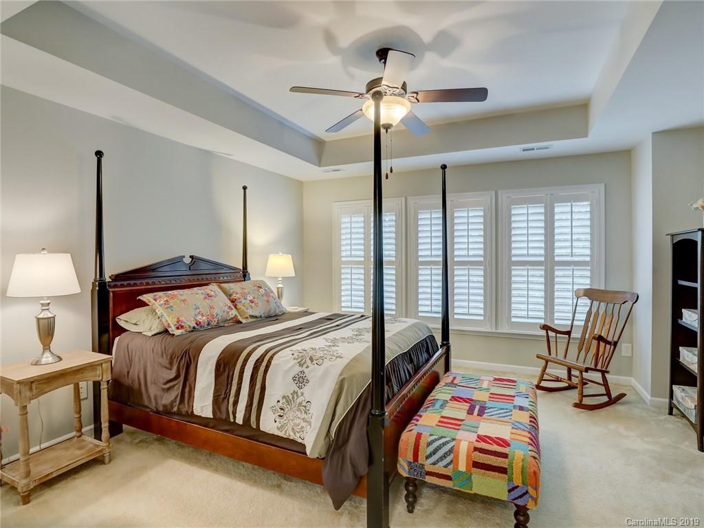 3462 Richard's Crossing Fort Mill, SC 29708 - Photo 25 of 42 a bedroom with bed and glass windows