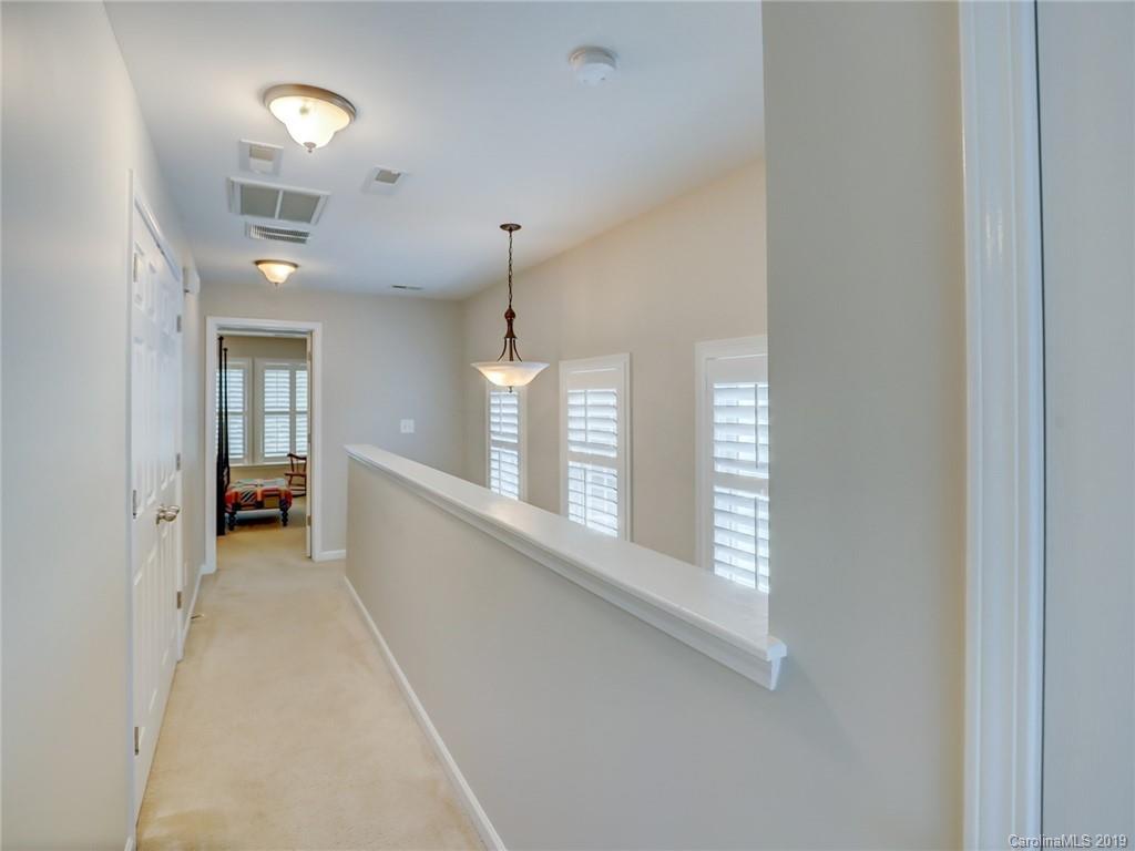 3462 Richard's Crossing Fort Mill, SC 29708 - Photo 38 of 42 a view of an empty room with a fireplace and a window