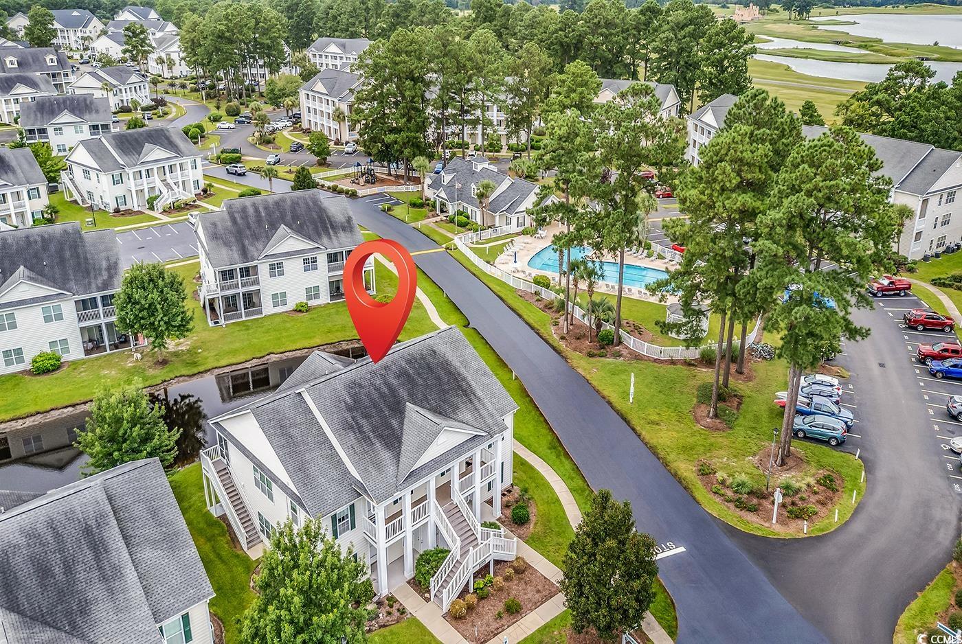 4909 Britewater Court, Unit 202 Myrtle Beach, SC 29579 - Photo 28 of 38 Aerial perspective of suburban area with a pool area