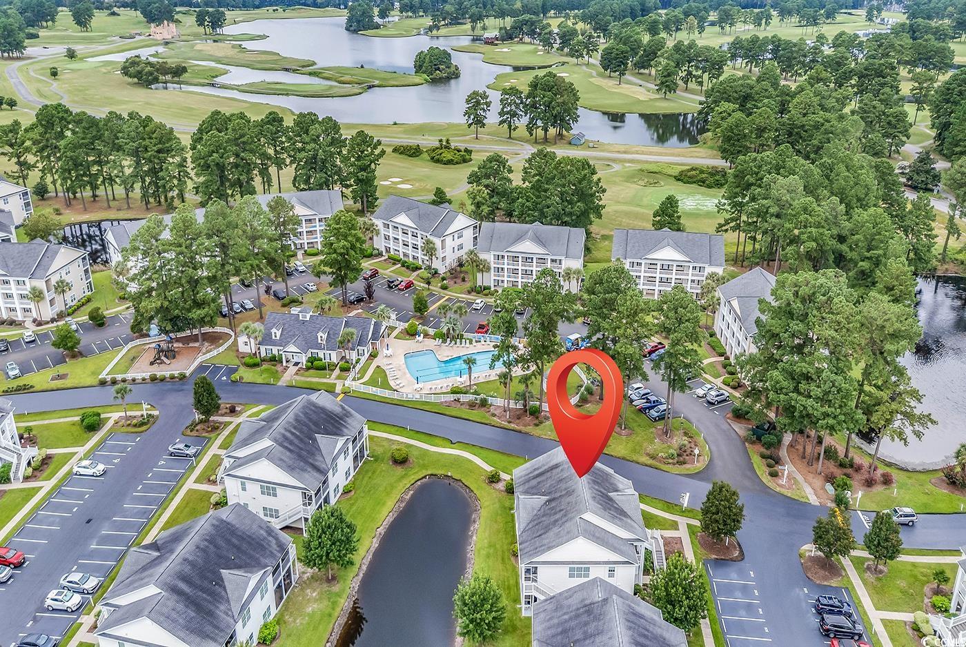 4909 Britewater Court, Unit 202 Myrtle Beach, SC 29579 - Photo 30 of 38 Drone / aerial view of a large body of water and a golf club