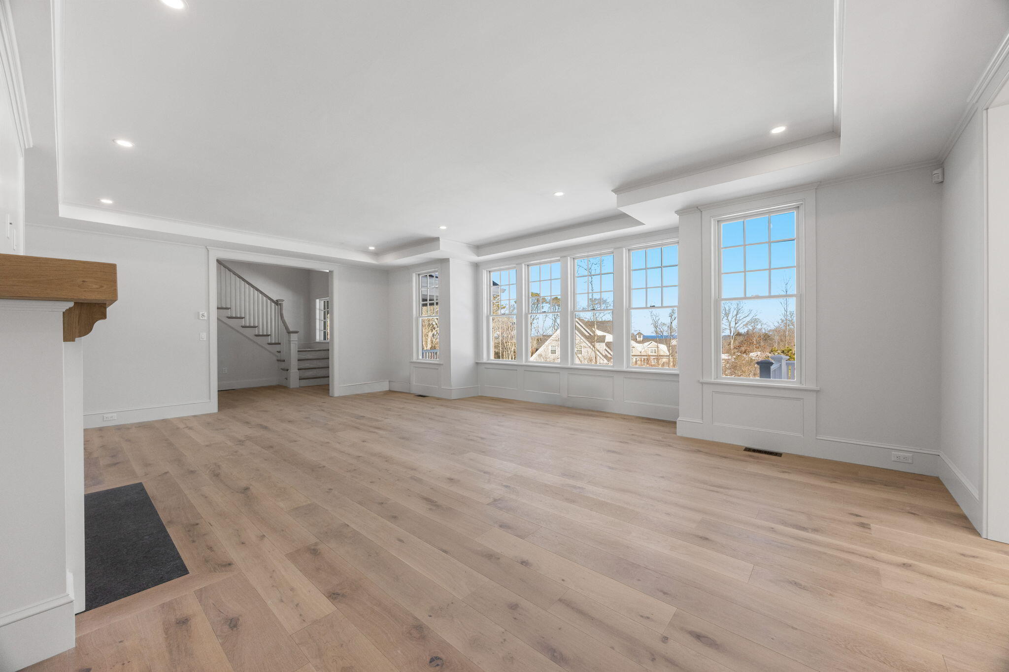 2 Rockhill Road Sandwich, MA 02563 - Photo 5 of 69 a view of an empty room with a window and wooden floor