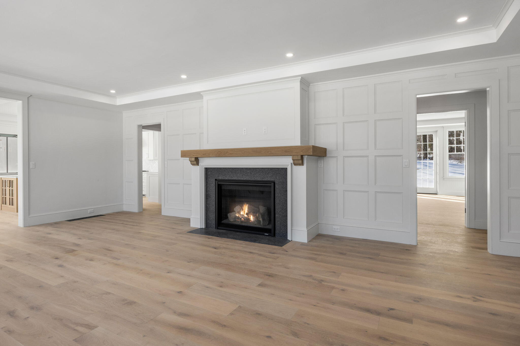 2 Rockhill Road Sandwich, MA 02563 - Photo 6 of 69 a view of an empty room with wooden floor fireplace and a window