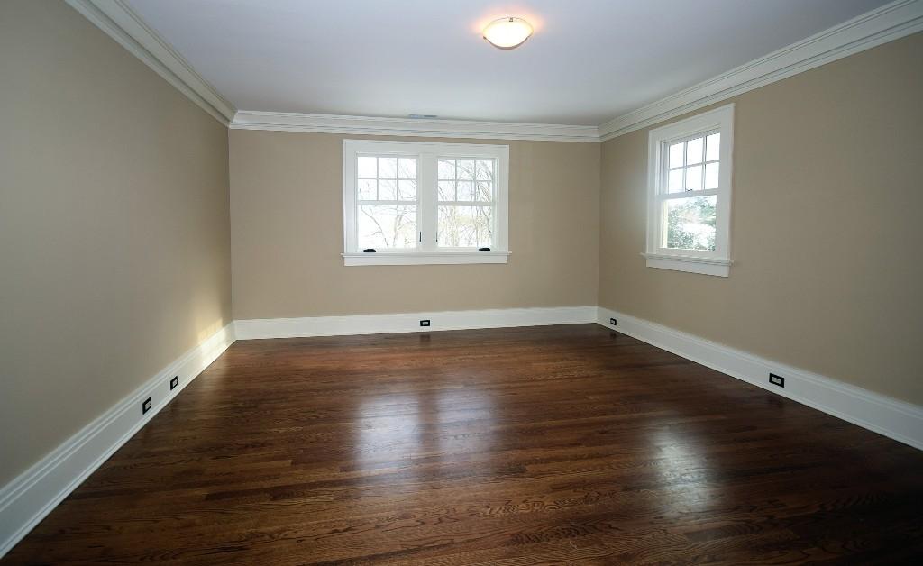 27 Harbor Road Darien, CT 06820 - Photo 17 of 22 an empty room with wooden floor and windows
