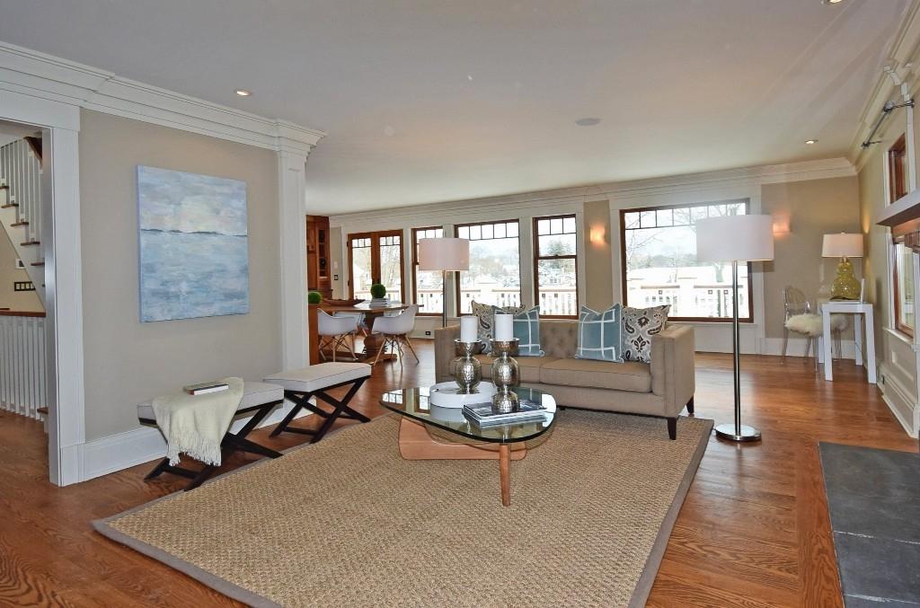 27 Harbor Road Darien, CT 06820 - Photo 6 of 22 a living room with fireplace furniture and floor to ceiling windows