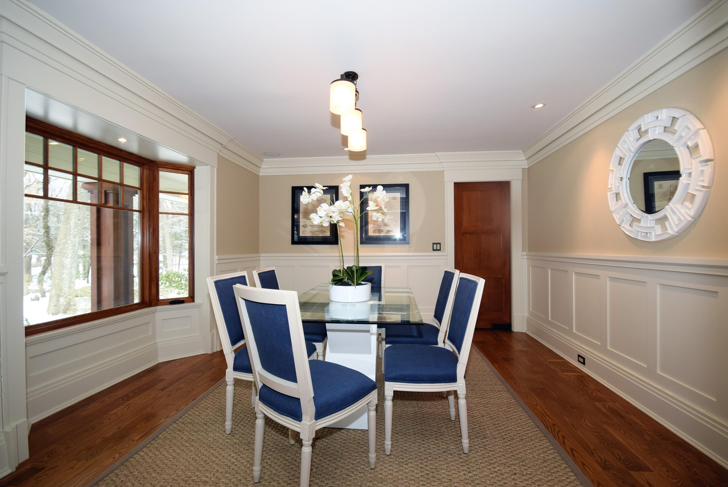 27 Harbor Road Darien, CT 06820 - Photo 8 of 22 a view of a dining room with furniture window and wooden floor