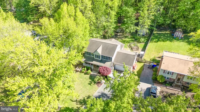 a view of a house with wooden walls