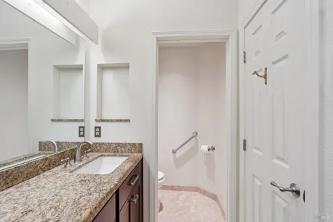 a kitchen with stainless steel appliances a stove and a sink