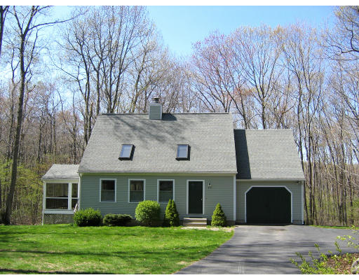 573 Burts Pit Road Northampton, MA 01062 - Photo 1 of 1 a front view of a house with a garden and trees