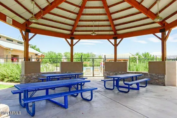 a view of a chairs and tables in the patio