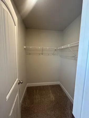 a view of a room with racks on the wall