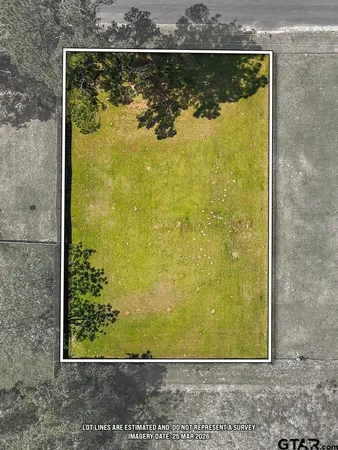 a view of yard with swimming pool and trees