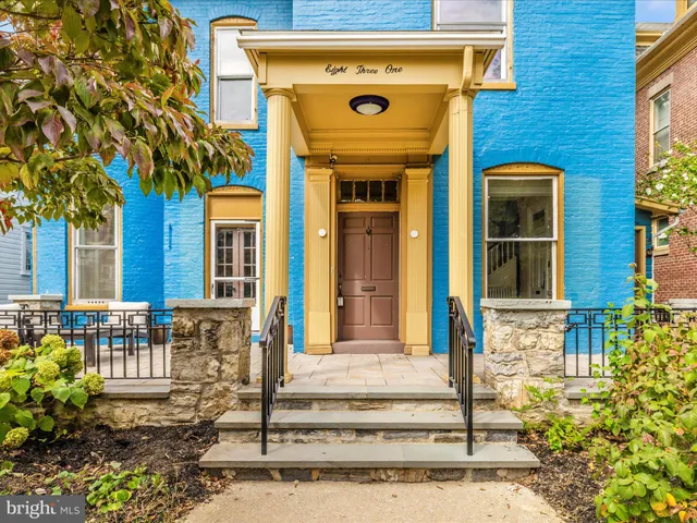 a front view of a house with a porch