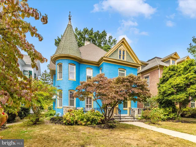 a picture of a wall with a white wall and a picture