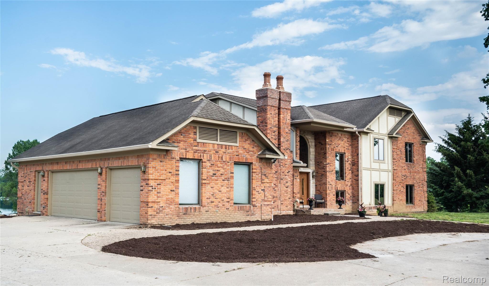 10165 Marshall Road South Lyon, MI 48178 - Photo 1 of 79 Large Over Sized 3 Car Garage w/ Entry to the Walkout Basement