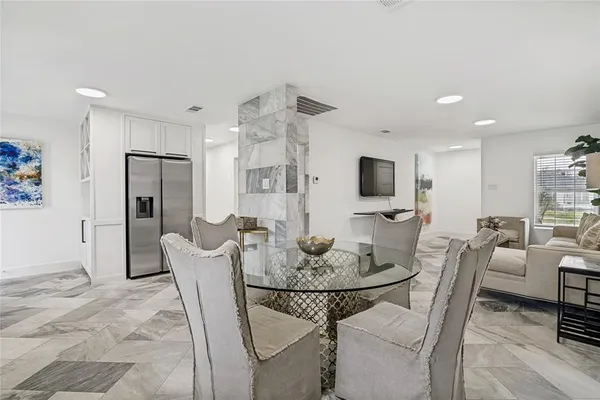 a view of a dining room with furniture