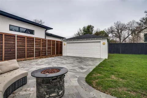 front view of a house with a garden