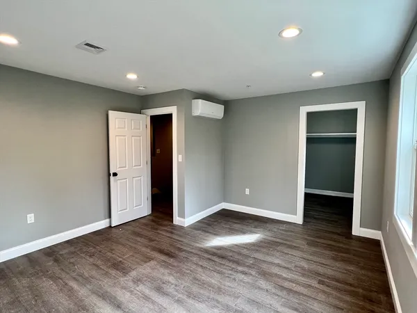 a view of livingroom with wooden floor