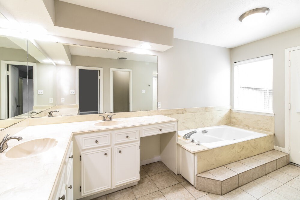 3635 Lost Oak Drive Spring, TX 77388 - Photo 11 of 16 a bathroom with a tub sink and mirror
