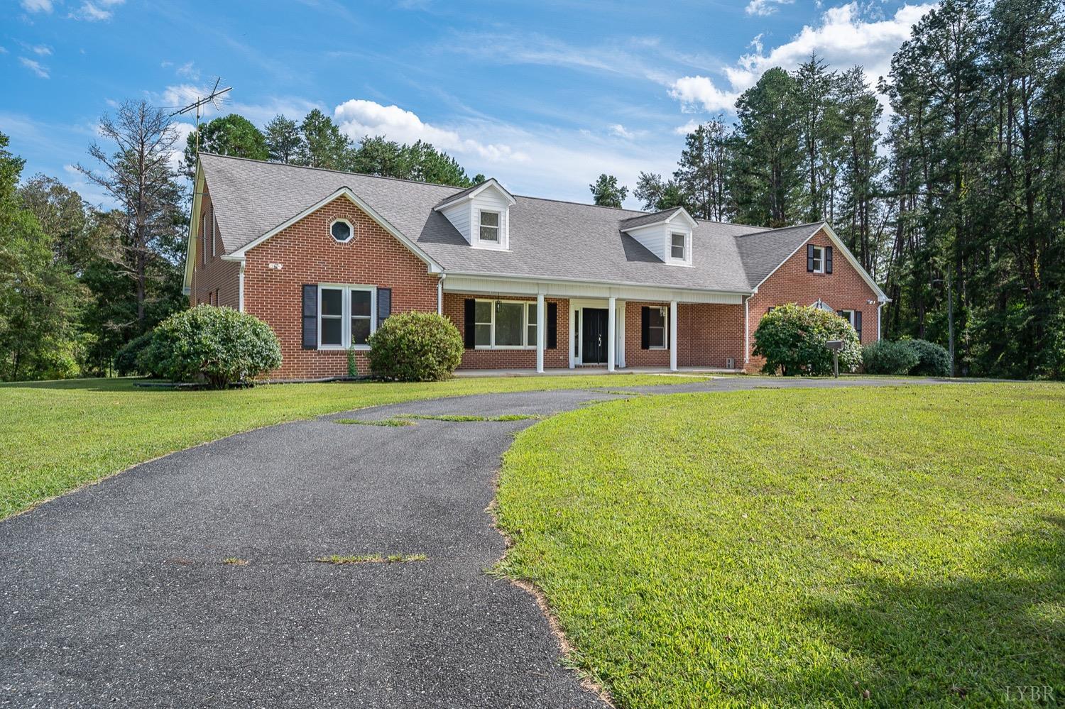 a front view of a house with yard