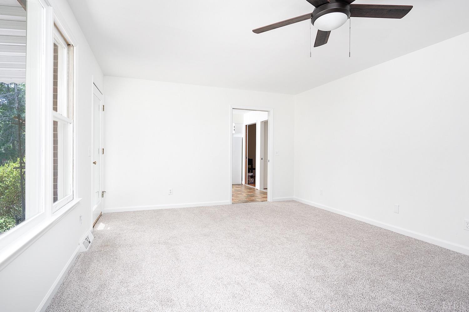 1309 White Fall Road Gretna, VA 24557 - Photo 13 of 64 a view of an empty room with a window