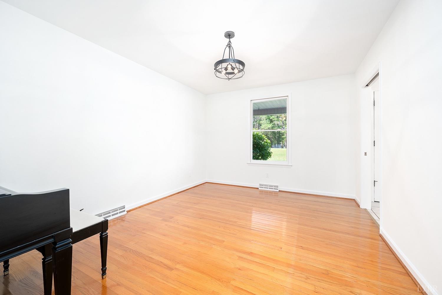 1309 White Fall Road Gretna, VA 24557 - Photo 19 of 64 a view of an empty room with window