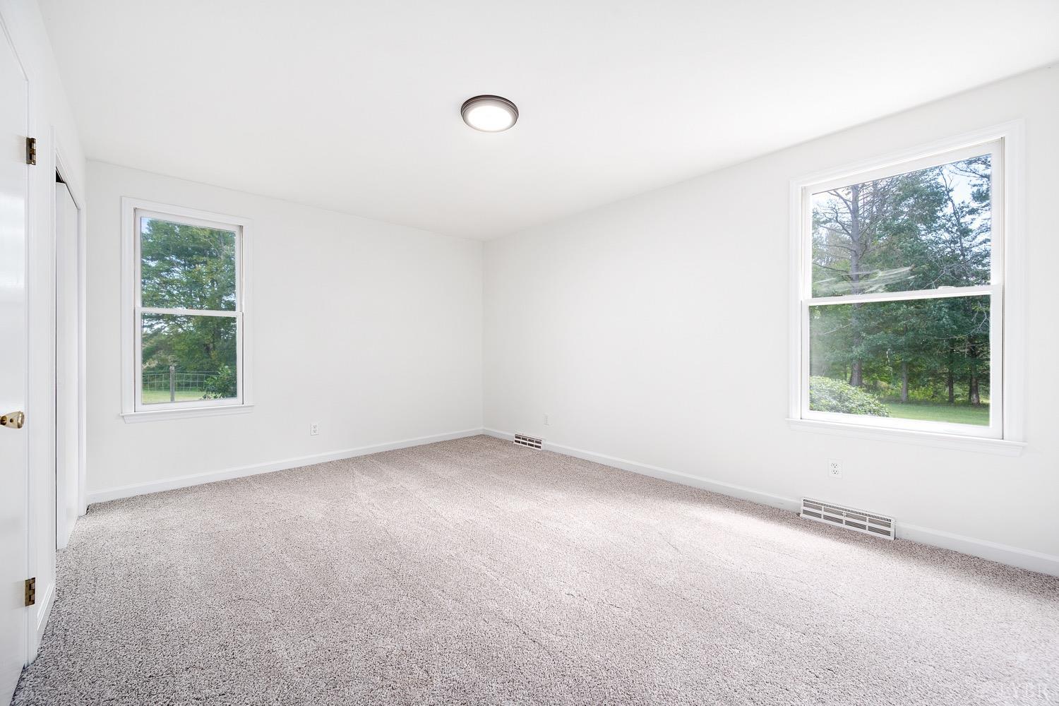 1309 White Fall Road Gretna, VA 24557 - Photo 25 of 64 an empty room with a window
