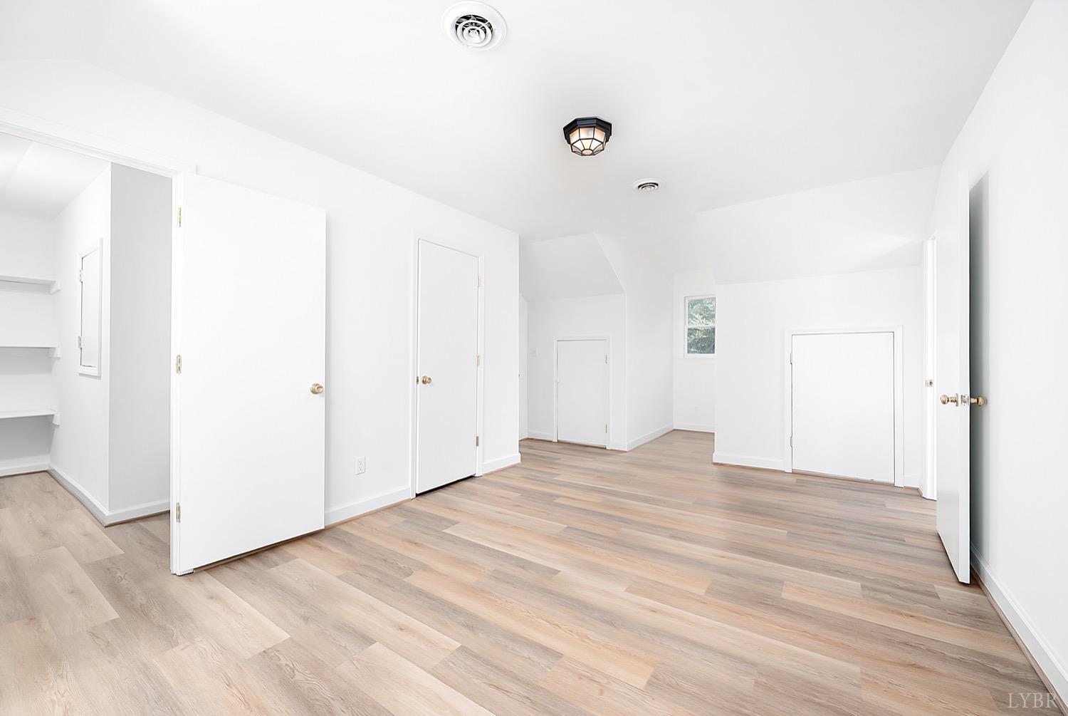 1309 White Fall Road Gretna, VA 24557 - Photo 35 of 64 a view of empty room with wooden floor