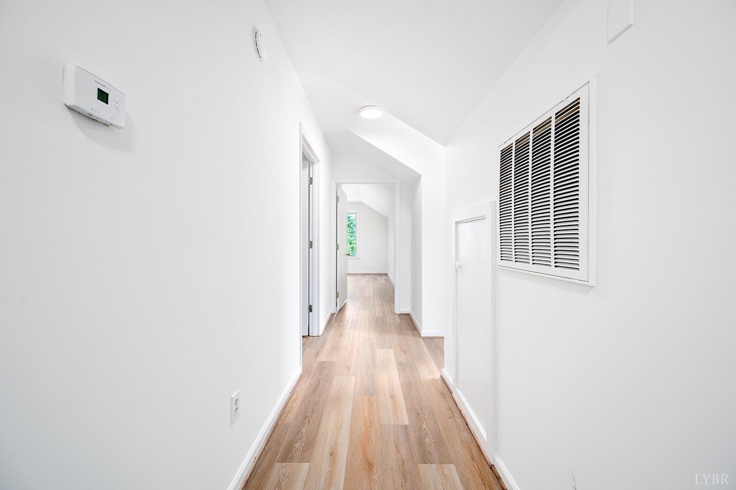 1309 White Fall Road Gretna, VA 24557 - Photo 41 of 64 a view of a hallway with wooden floor
