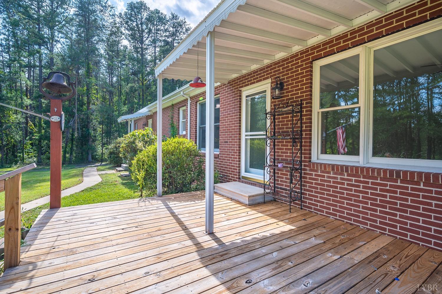 1309 White Fall Road Gretna, VA 24557 - Photo 51 of 64 a view of a house with backyard and wooden floor
