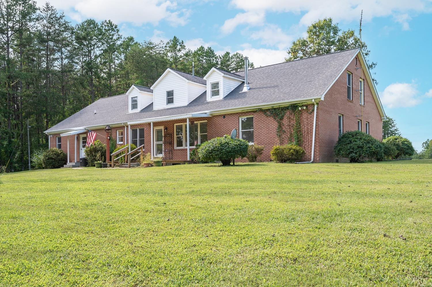 1309 White Fall Road Gretna, VA 24557 - Photo 60 of 64 a front view of a house with garden