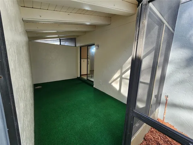 a view of back yard of the house