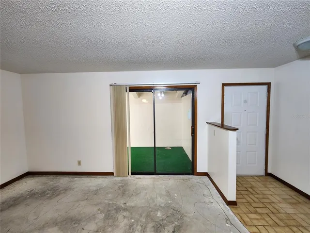 a view of an empty room with window