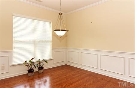 3407 Ranbir Drive Durham, NC 27713 - Photo 4 of 25 The dining room features a large double window w 2" blinds, Bruce hardwood floors, and quality moldings. Dining Room