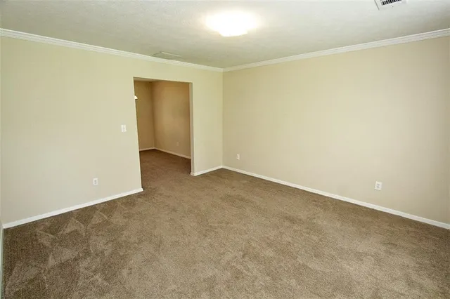 an empty room with an entryway