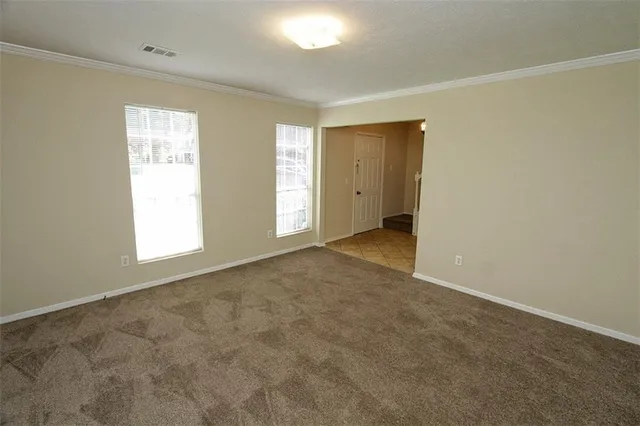 a view of an empty room with window