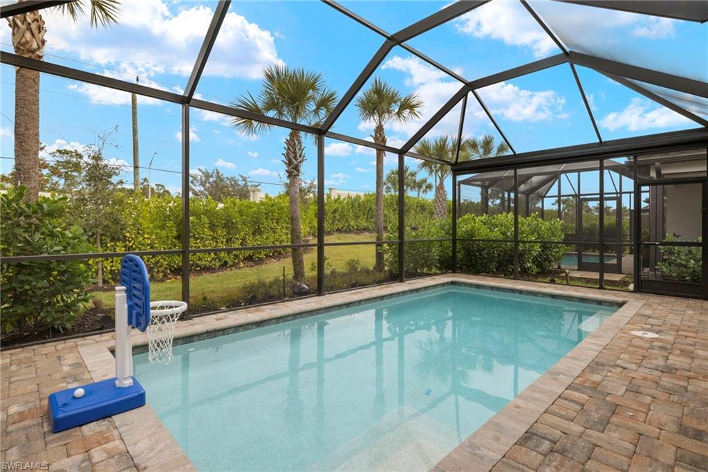 2170 Yellowfin Circle Naples, FL 34114 - Photo 21 of 26 a view of swimming pool with a patio