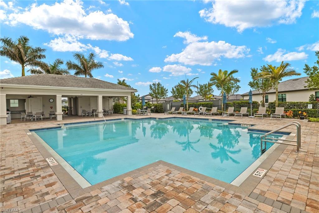 2170 Yellowfin Circle Naples, FL 34114 - Photo 26 of 26 a view of a swimming pool with a patio