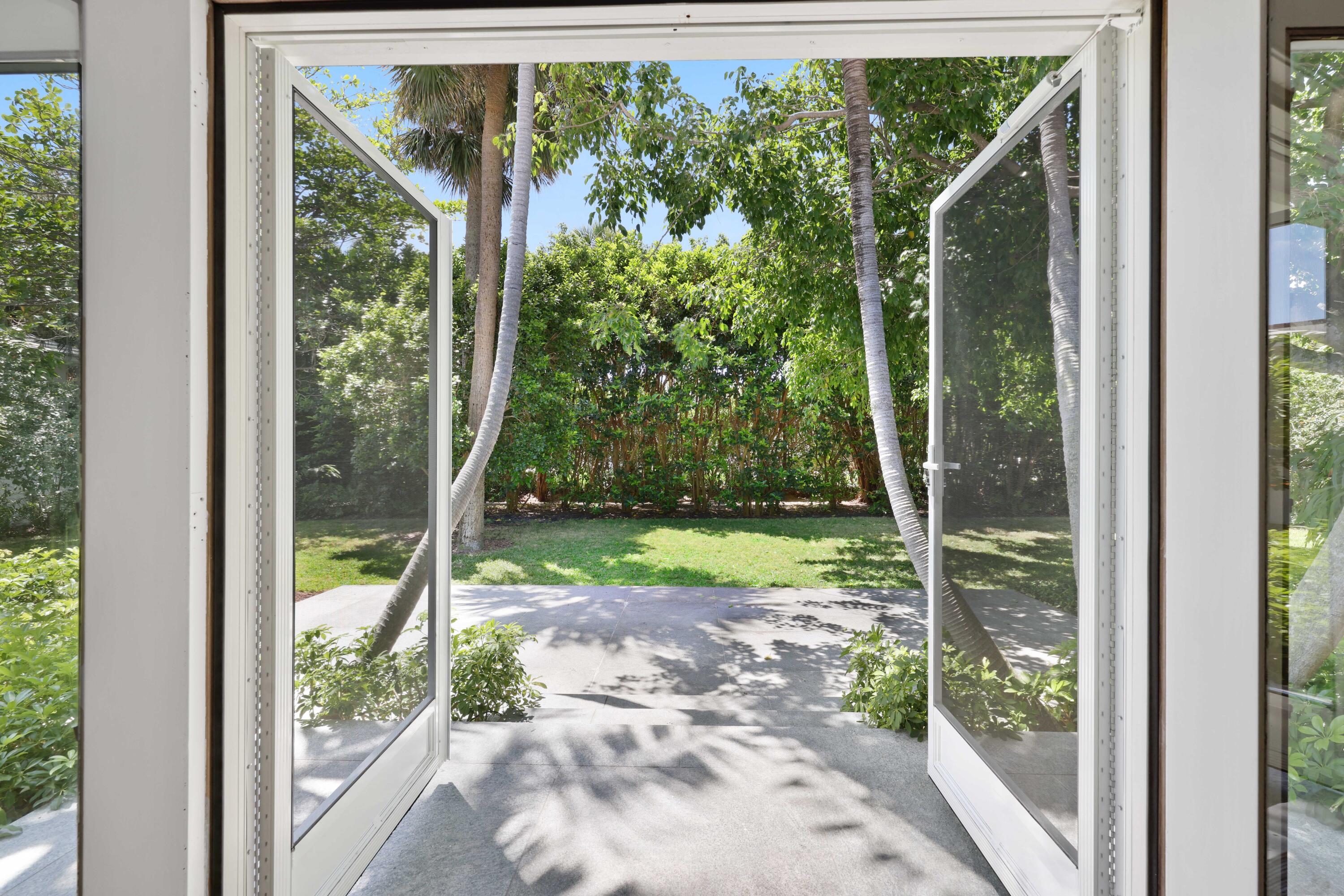 246 Merrain Road Palm Beach, FL 33480 - Photo 21 of 31 a view of a yard in front of a house