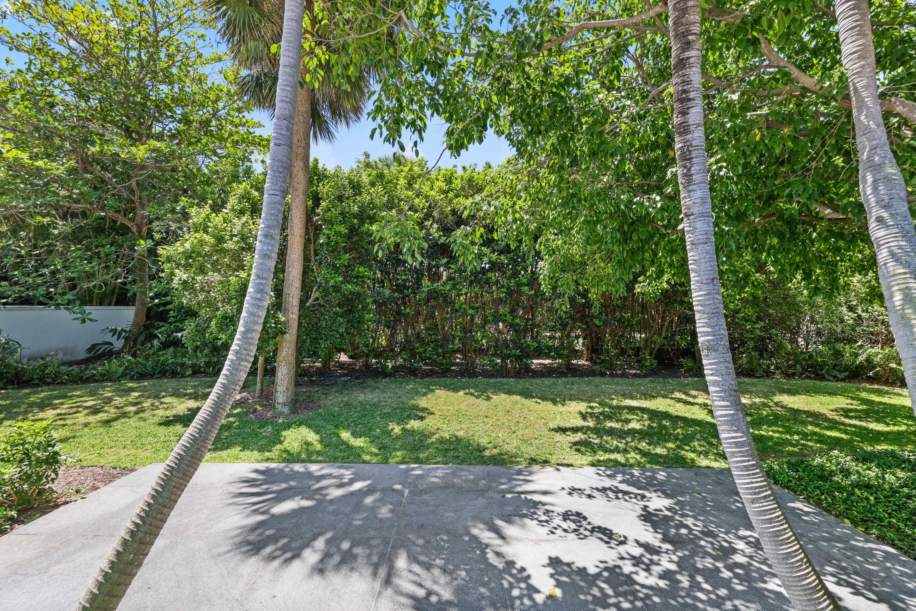 246 Merrain Road Palm Beach, FL 33480 - Photo 22 of 31 a view of a park with large trees