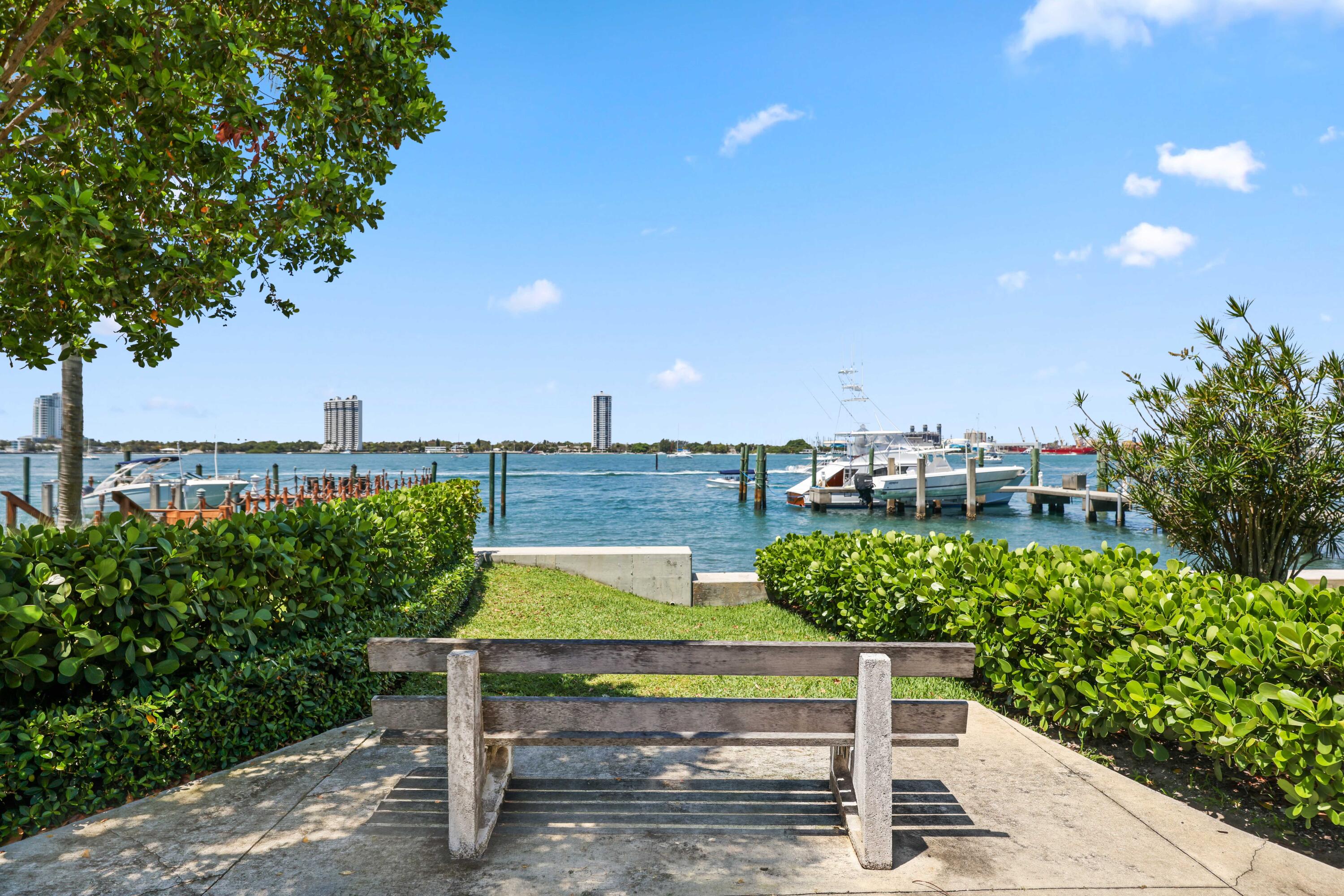 246 Merrain Road Palm Beach, FL 33480 - Photo 28 of 31 a view of a chairs and table in the patio