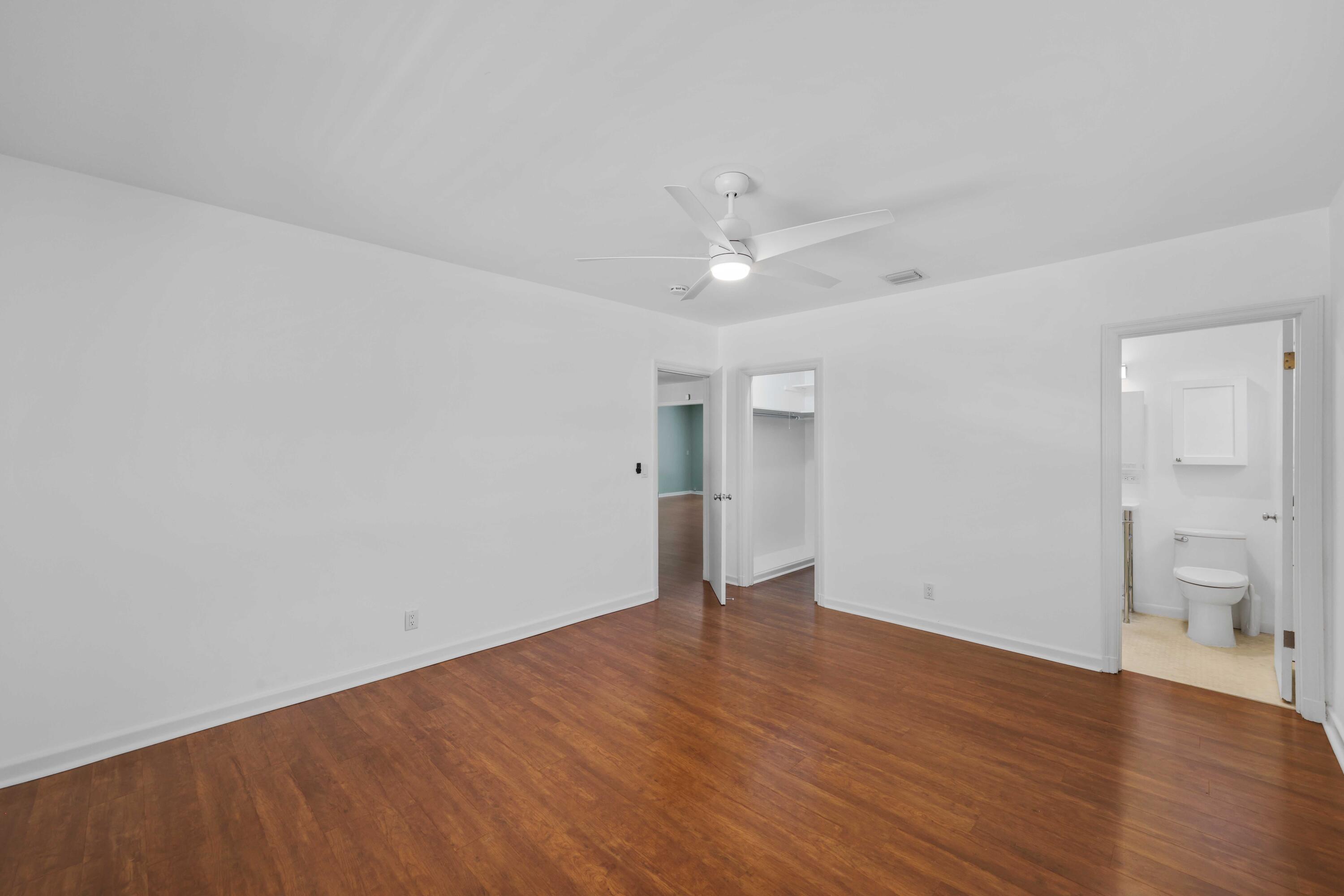 246 Merrain Road Palm Beach, FL 33480 - Photo 8 of 31 wooden floor in an empty room