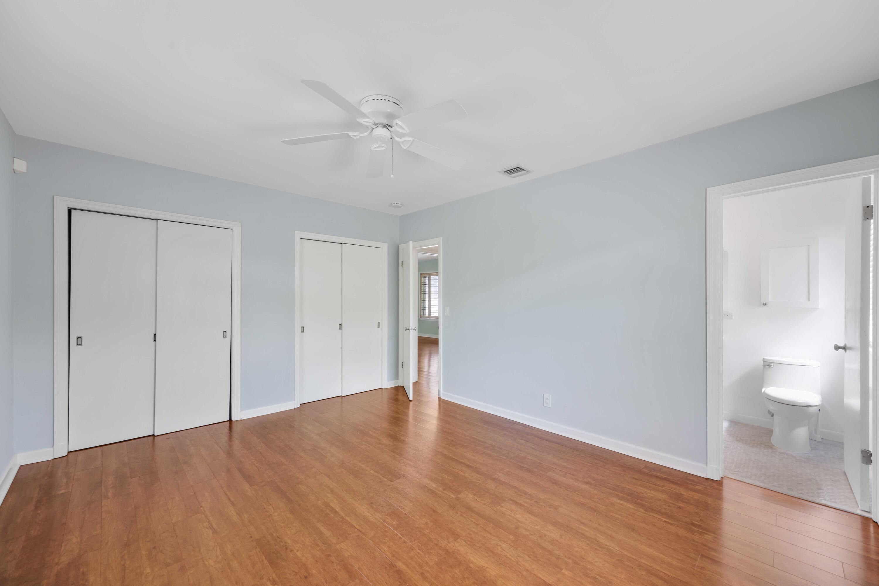 246 Merrain Road Palm Beach, FL 33480 - Photo 10 of 31 a view of an empty room and wooden floor
