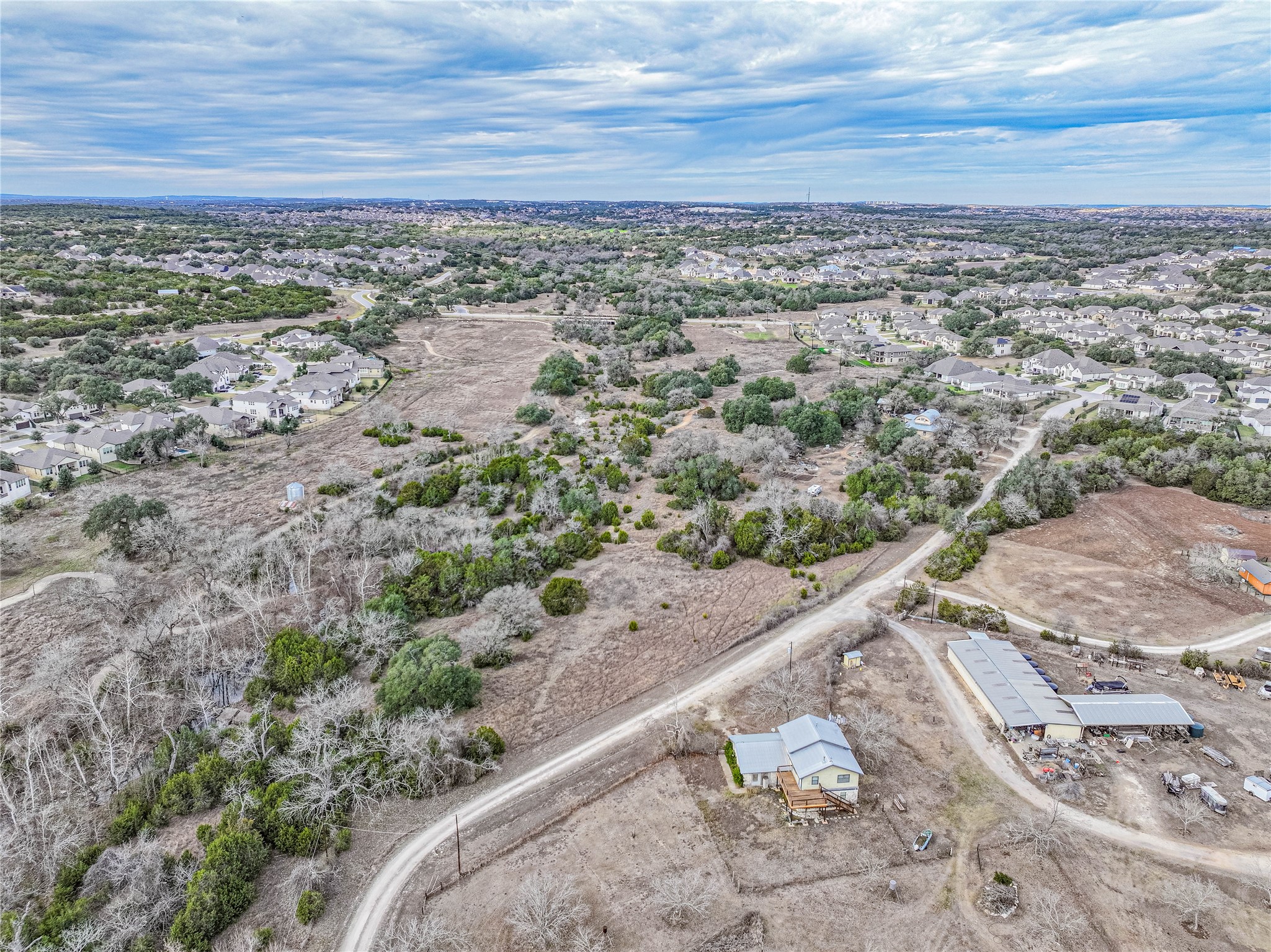3 Rr-1826 Road Austin, TX 78737 - Photo 3 of 17 Aerial view of property and surrounding area with rural landscape