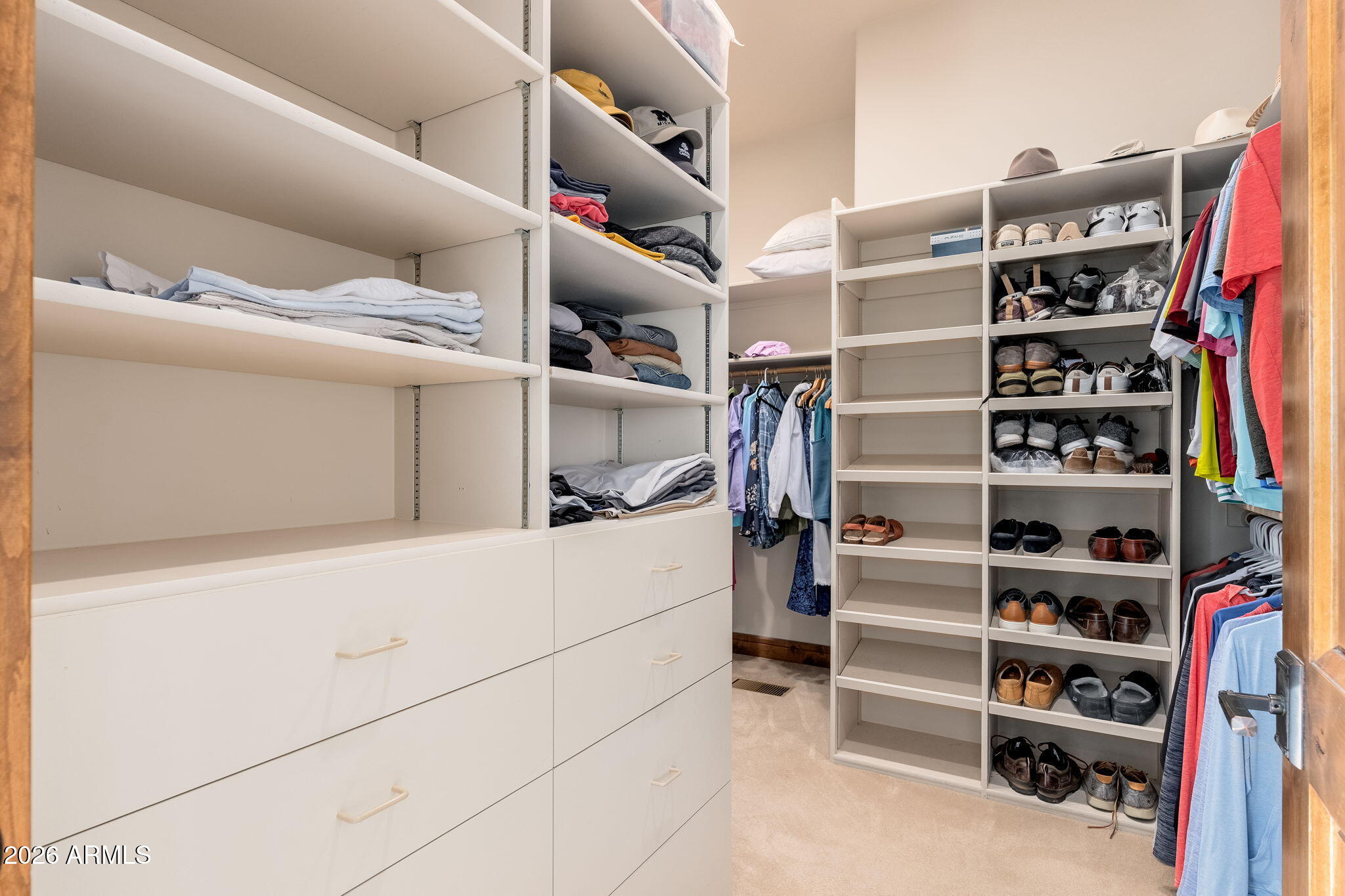3000 East Thunder Point Payson, AZ 85541 - Photo 26 of 105 a view of walk in closet with clothes and shoes