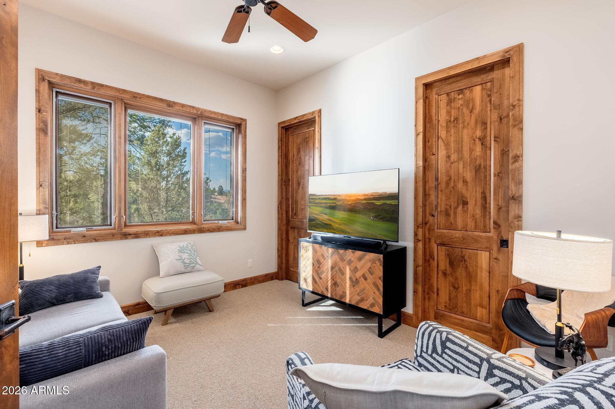 3000 East Thunder Point Payson, AZ 85541 - Photo 27 of 105 a living room with furniture and a flat screen tv
