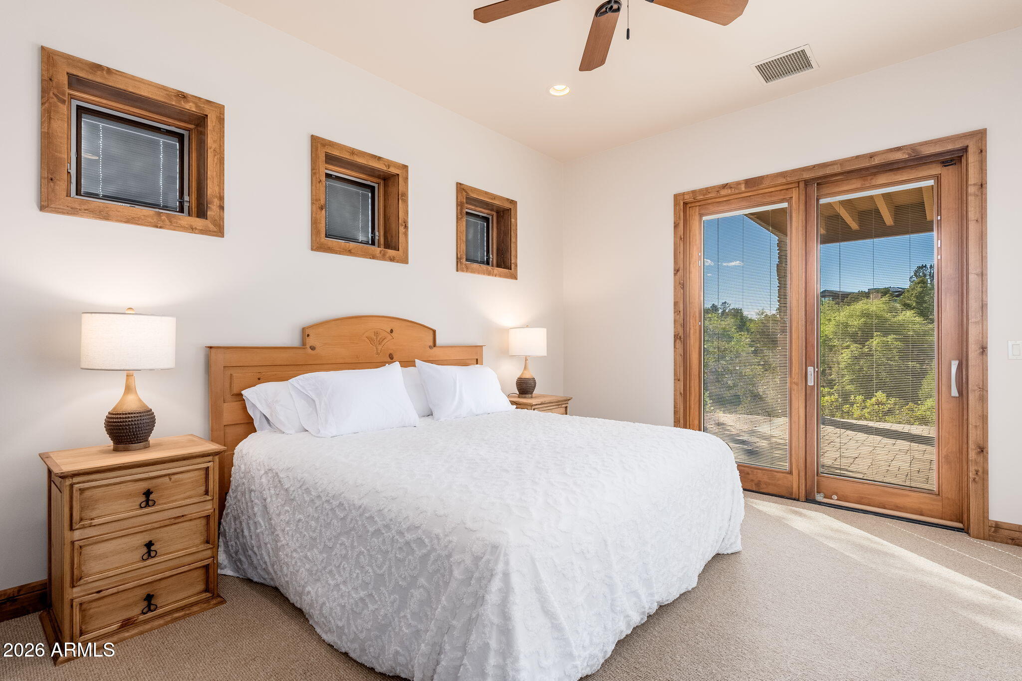 3000 East Thunder Point Payson, AZ 85541 - Photo 38 of 105 a bedroom with a bed a lamp and window