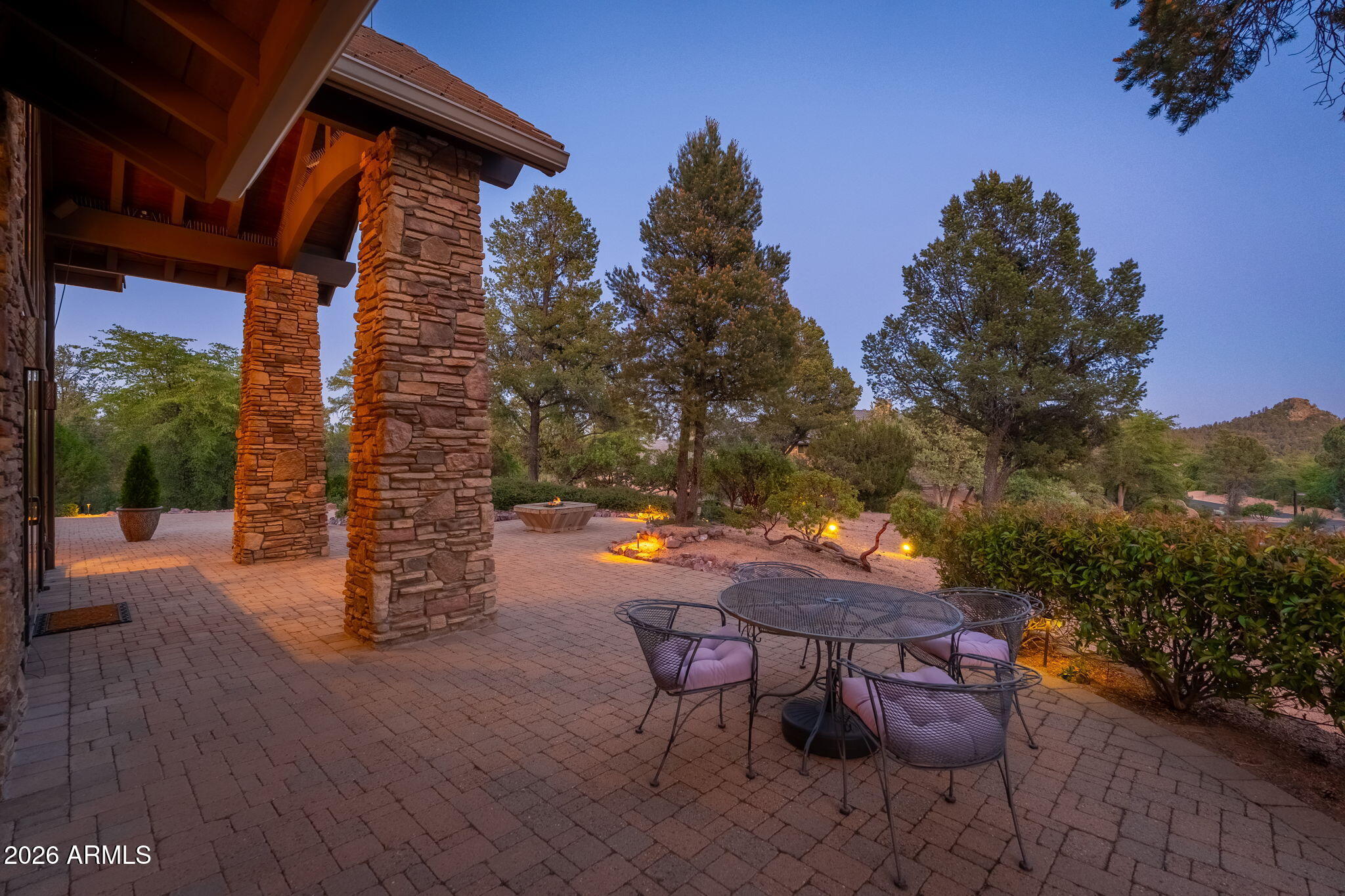 3000 East Thunder Point Payson, AZ 85541 - Photo 61 of 105 a backyard of a house with table and chairs