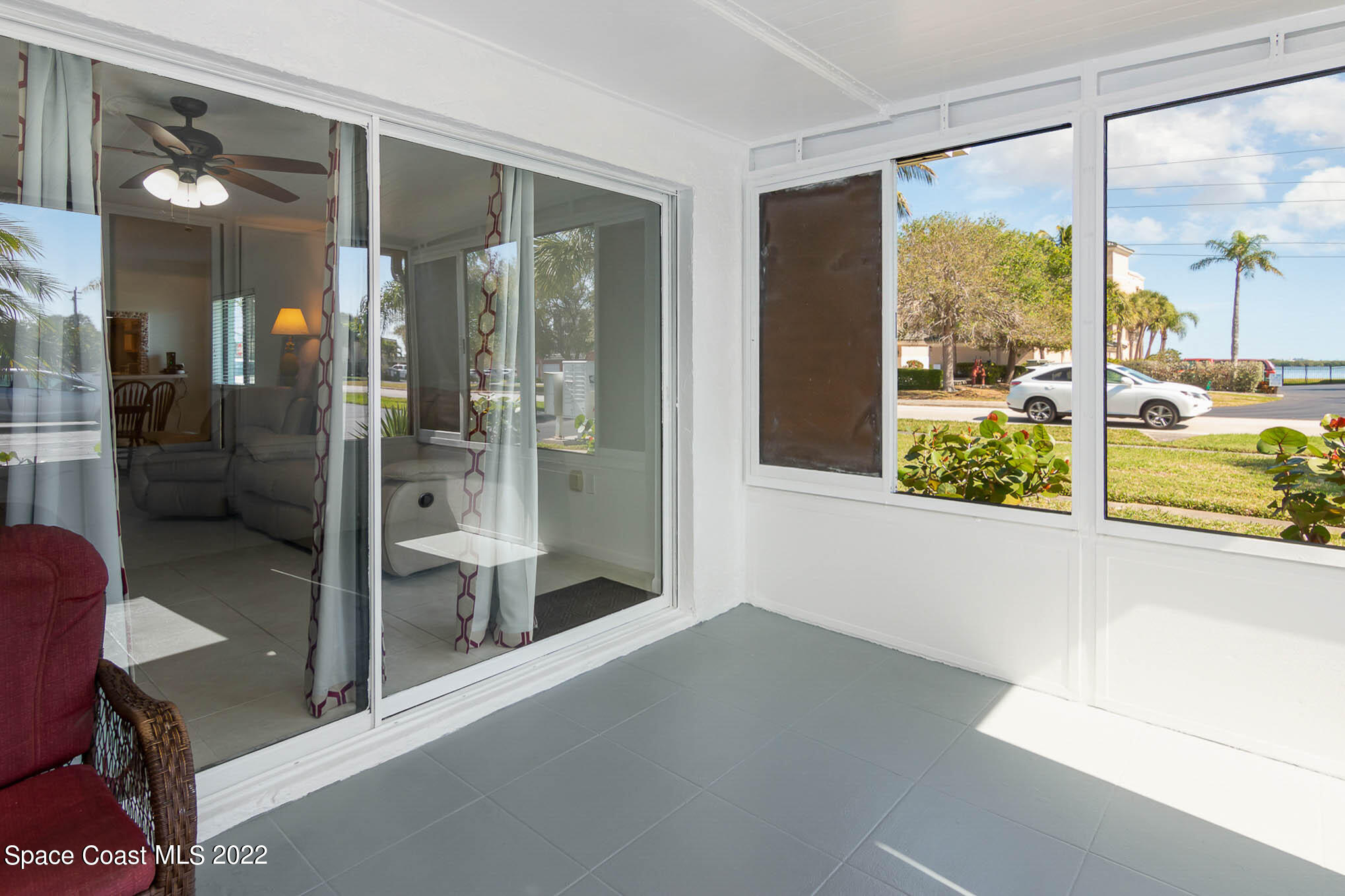 2 Country Club Road, Unit 20 Cocoa Beach, FL 32931 - Photo 19 of 23 a view of a room with a large window