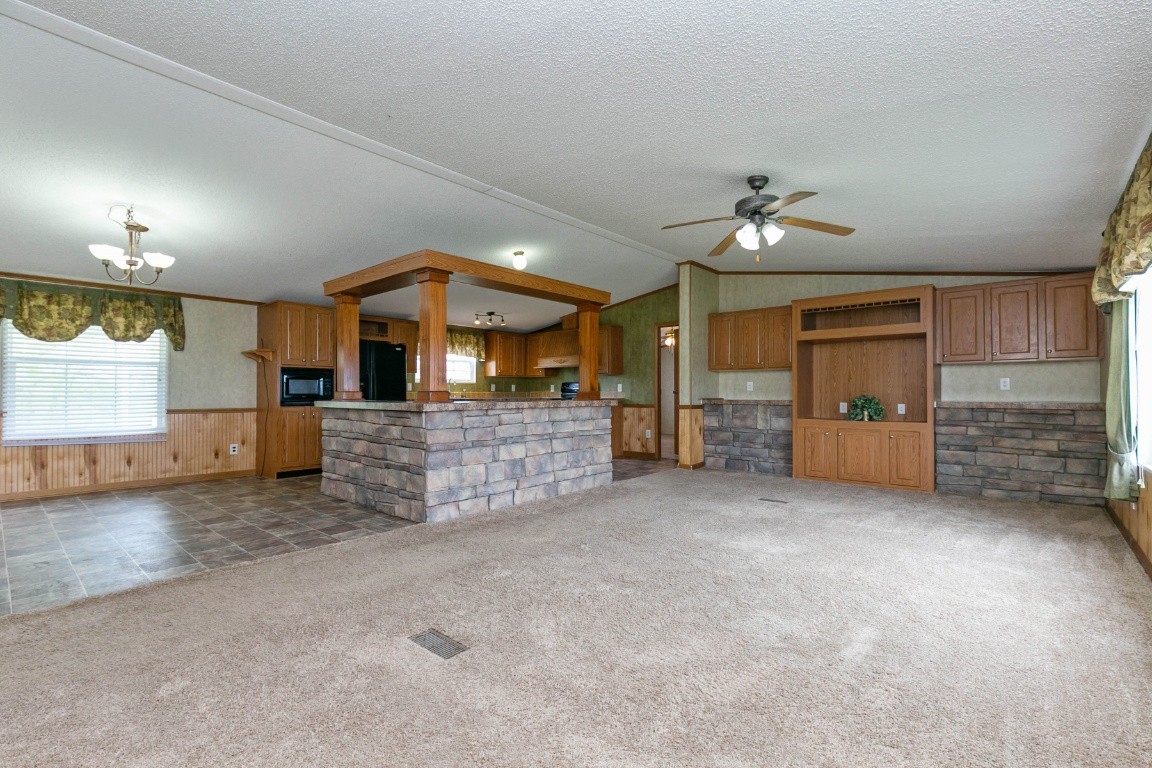 399 Calvert Ridge Road Westmoreland, TN 37186 - Photo 3 of 31 a view of a livingroom with furniture and a kitchen